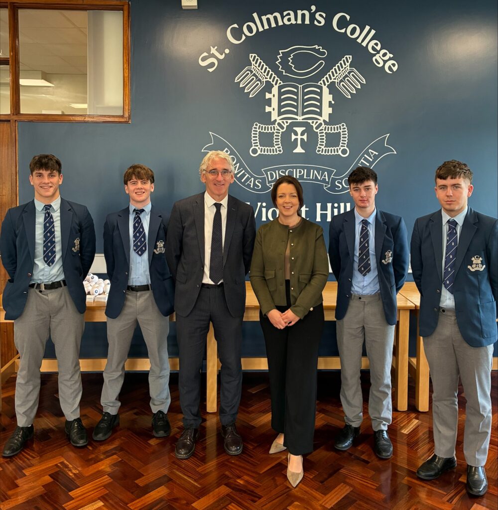 Liz Kimmins discusses Northern Ireland driving rules with students at St Colman's College