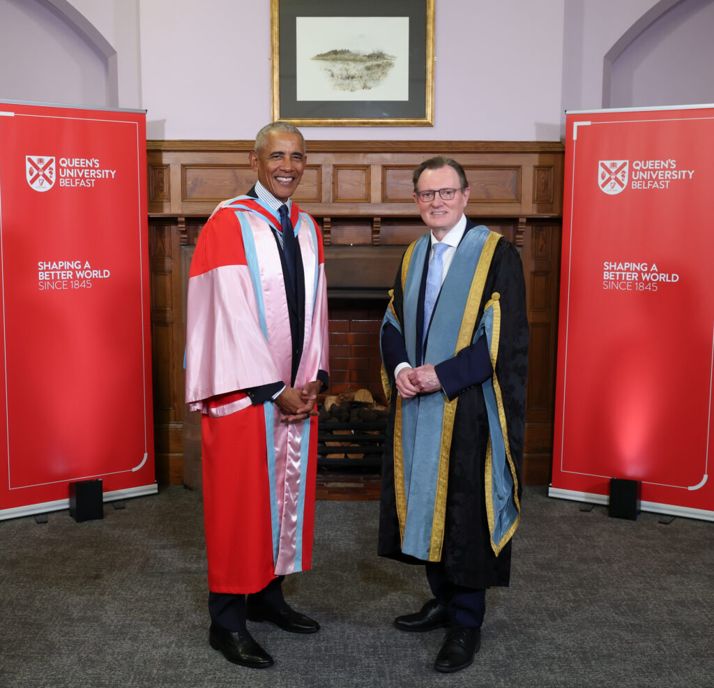 Barack Obama stands alongside Queen's University Belfast President and Vice-Chancellor Professor Sir Ian Greer.