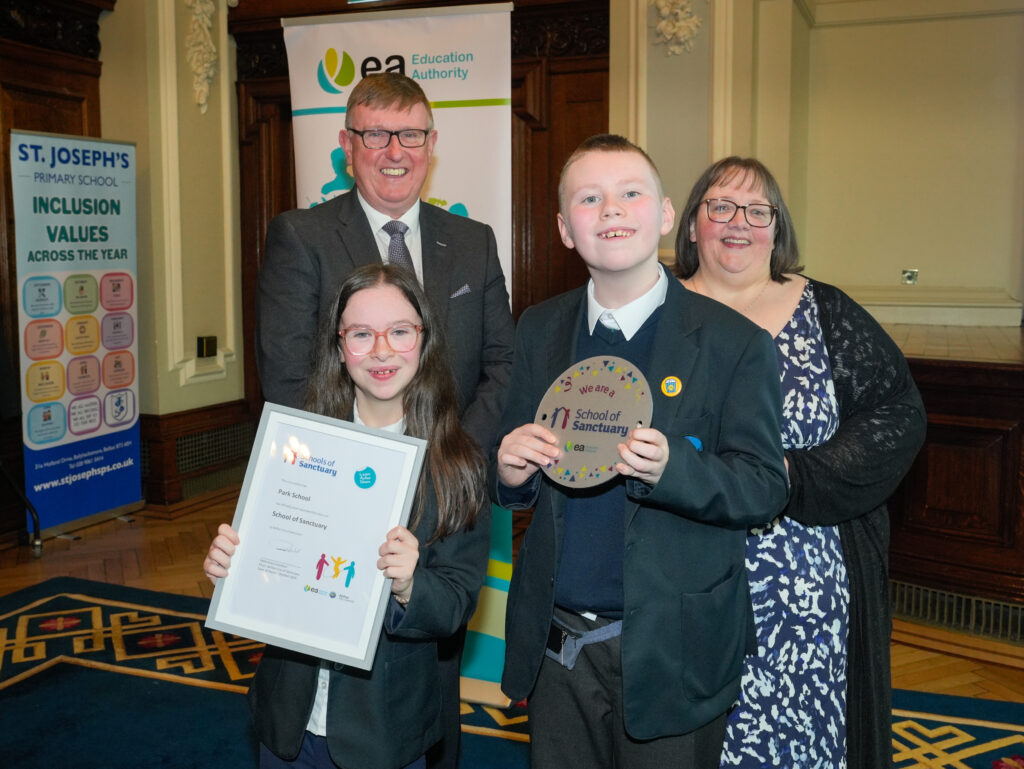 Mervyn Storey presenting Park School with its award