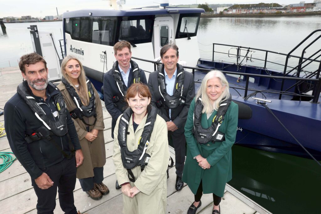 Economy Minister Caoimhe Archibald with project partners following the announcement of £15 million for zero-emission transport and energy innovation at Belfast Harbour.