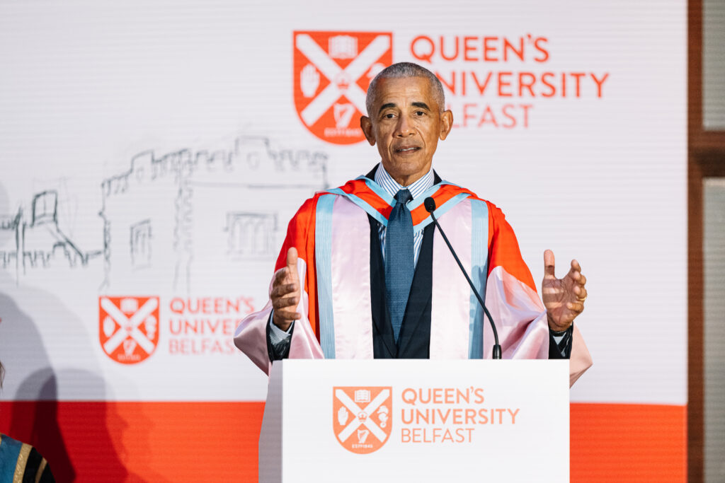 Barack Obama delivers an address during his honorary doctorate ceremony at Queen's University Belfast.