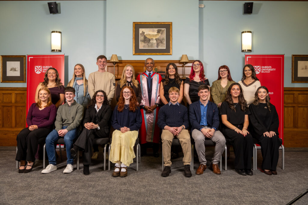 Barack Obama pictured with a group of students at Queen's University Belfast.
