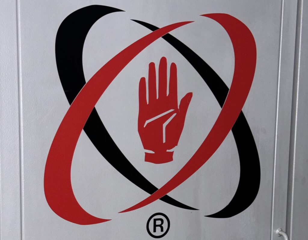 Ulster Rugby logo on a wall