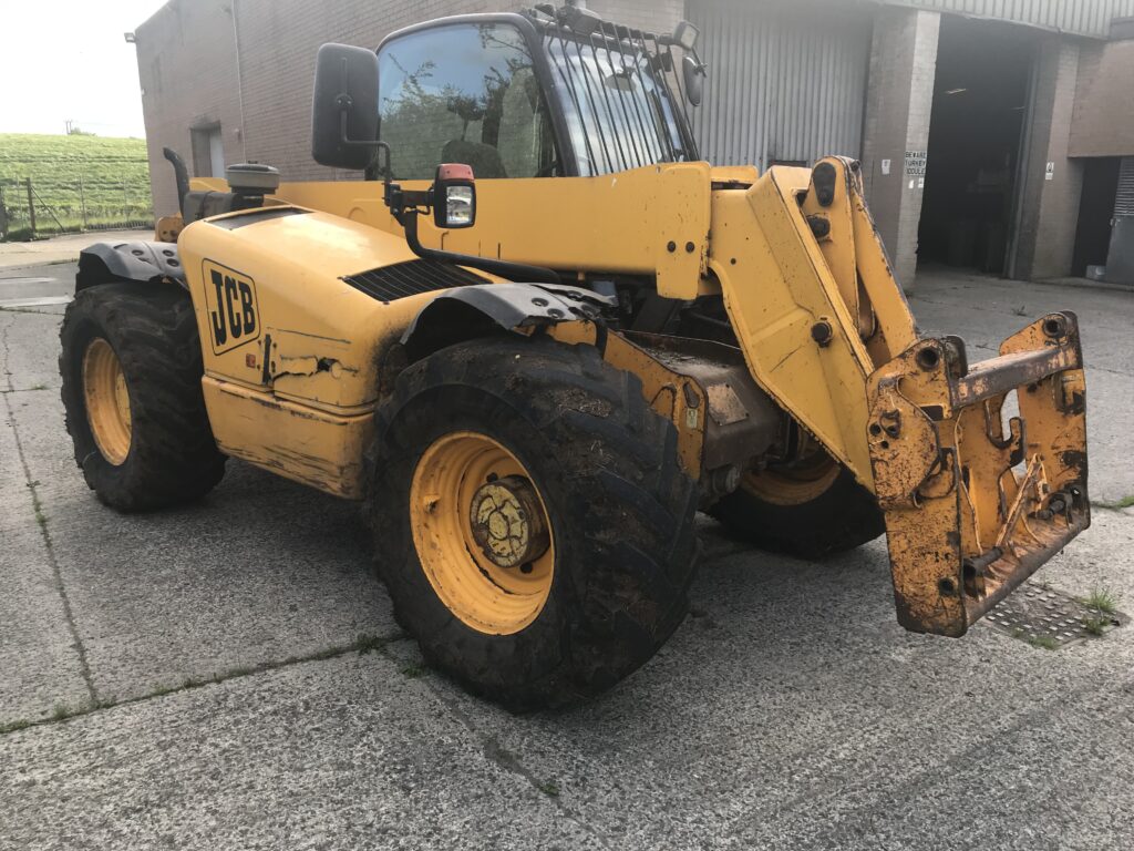 Yellow JCB telehandler pictured in a PSNI appeal following machinery theft in Cullybackey