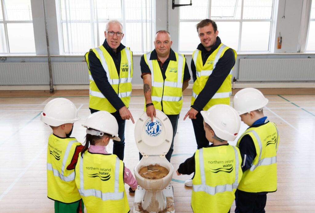 pupils of St Patricks Newry inspecting a toilet