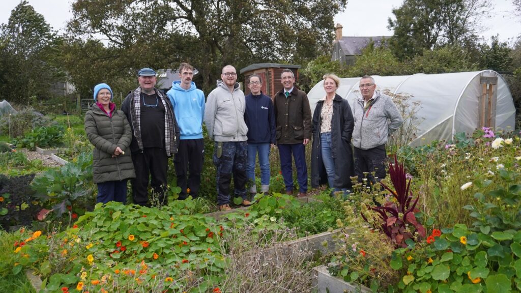 Agriculture Minister Andrew Muir with members of The Quarries Farm following the announcement of social farming grants