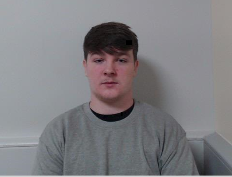 PSNI custody photograph of Kydyn Carley, 18, sentenced to 44 months for his involvement in the June 2025 Ballymena riots.