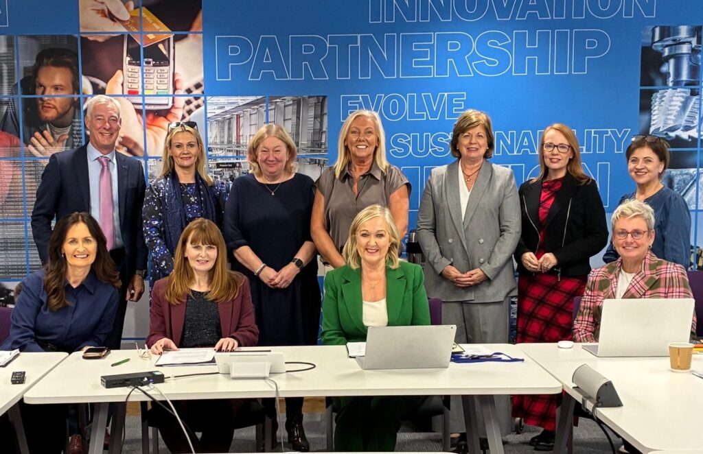 Economy Minister Caoimhe Archibald with Northern Ireland Skills Council members following the council's relaunch